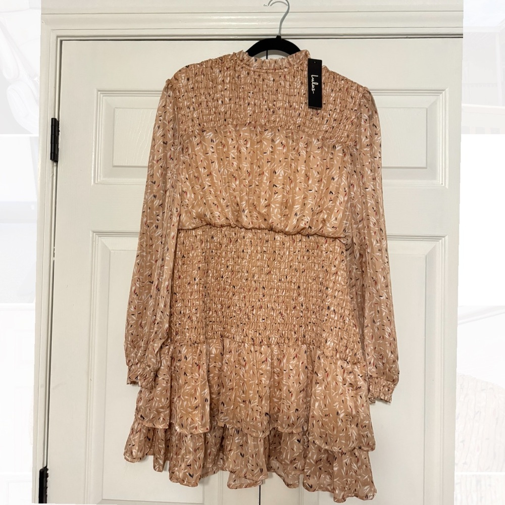 This new with tags lulu dress is perfect for fun flowy spring vibes.